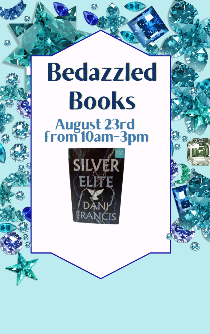Different colored blue and green gems with a book cover that is bedazzled with them
